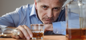 A man has drank too much alcohol